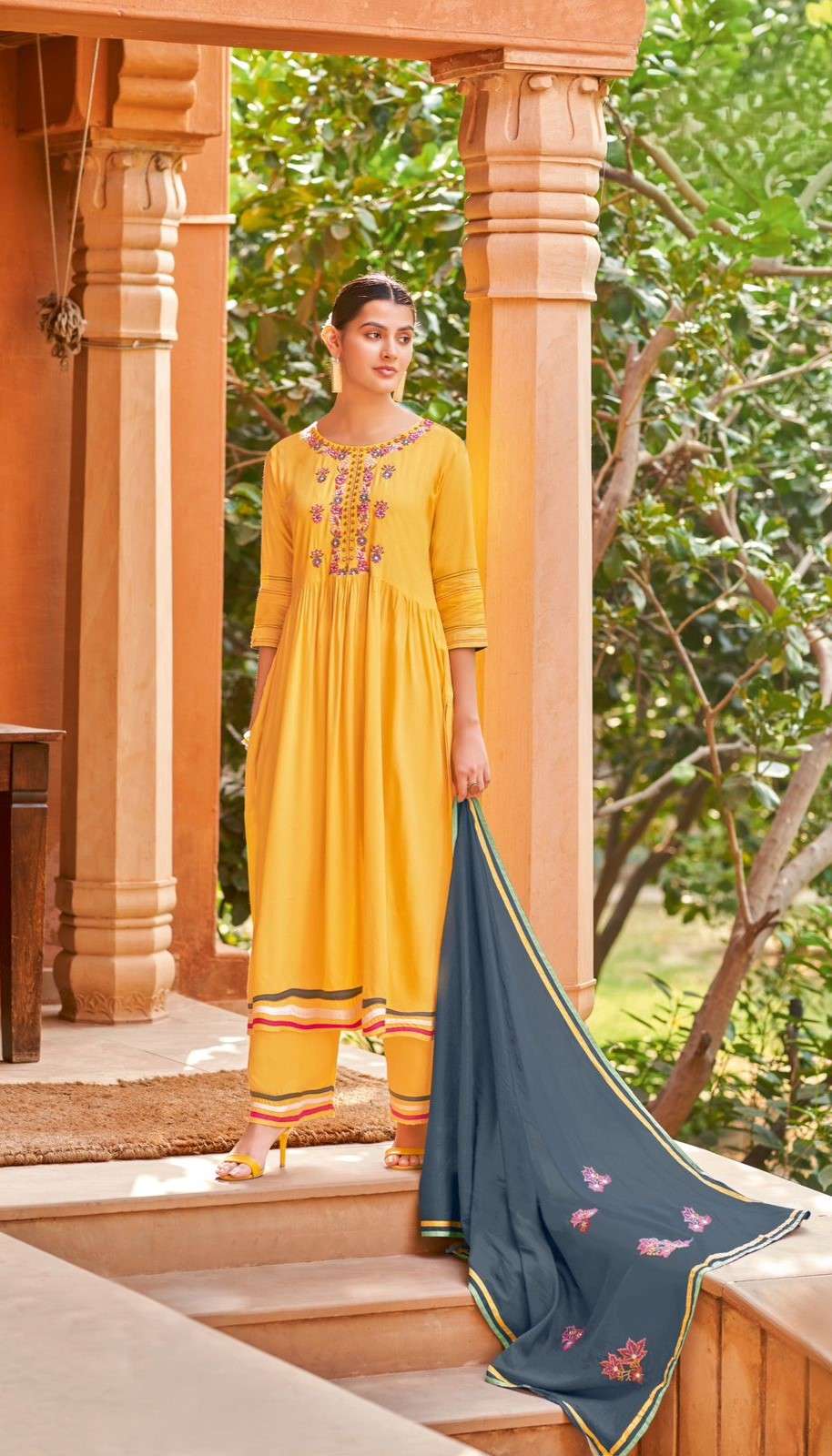 Stunning Rayon Weaving Kurti Set featuring intricate Handwork and Embroidery paired with a Mull Cotton Dupatta with work